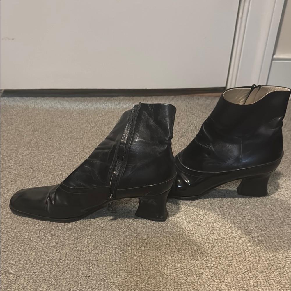 Prada Black Heeled Boots with Sleek Design